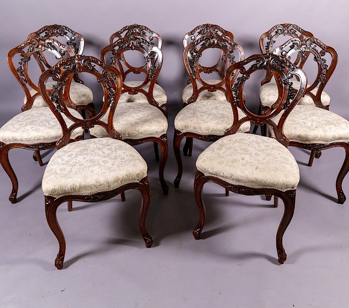 A Set of 10 Victorian Walnut Dining Chairs