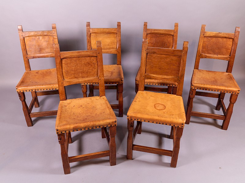 A set of 6 Gnome Man Dining Chairs
