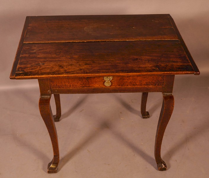 An Early 18th century side table in Oak