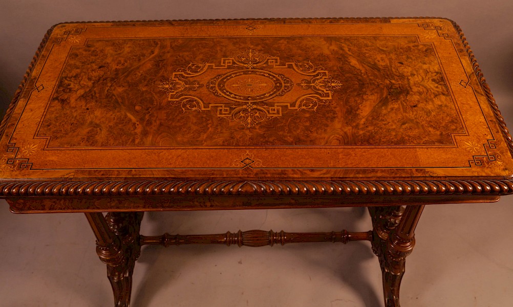 A Super Quality Victorian Burr Walnut and Marquetry Games Table