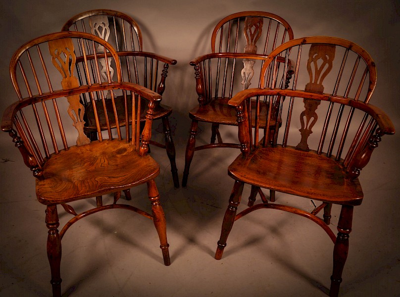 A Good set of 4 Yew Wood Windsor Chairs by George Nicholson