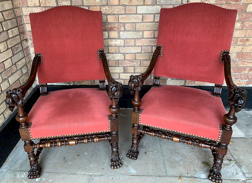 An Impressive pair of Victorian Armchairs carved lions