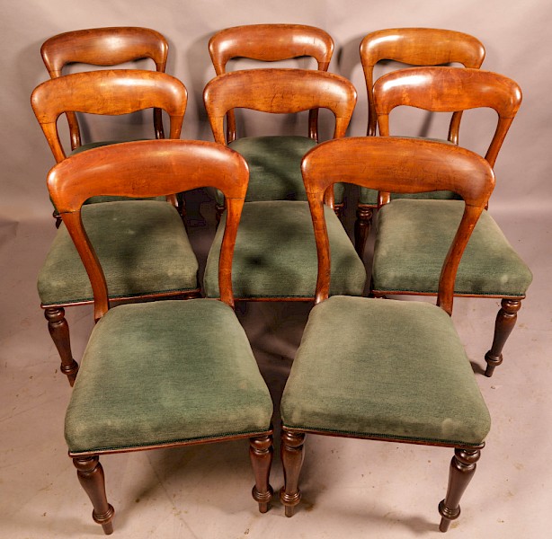 A Set of 8 Balloon Back Dining Chairs