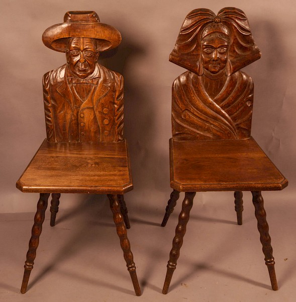A Pair of Black Forest Lady and Gentleman Hall Chairs