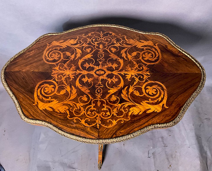 A super Kingwood and Rosewood    marquetry inlaid Table