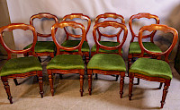 A set of 8 Victorian Mahogany Balloon Back dining chairs
