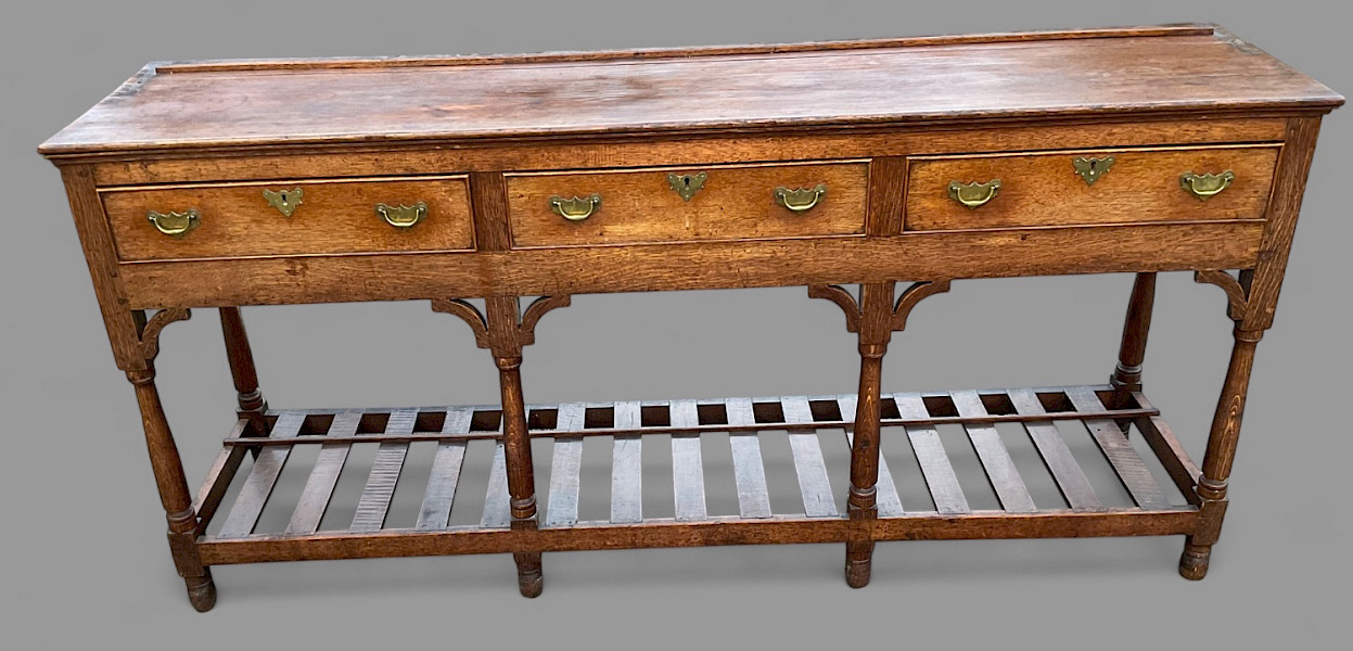 A Georgian oak serving dresser