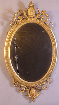 A Georgian Oval Gilt Framed Mirror