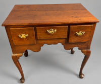 A Georgian oak low boy circa 1750